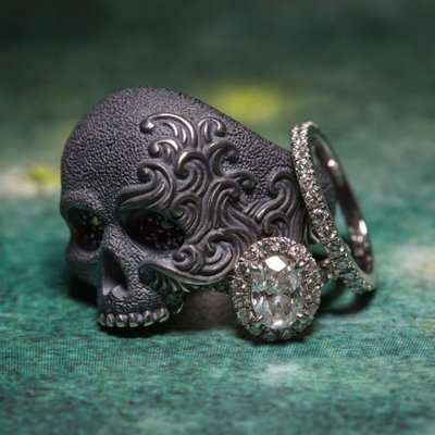 Skull Groom's Ring with Bride's Diamond Rings - Macro