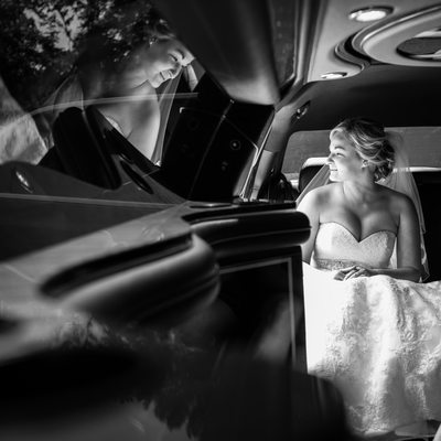 Downingtown Wedding - Bride in Limo with Reflection