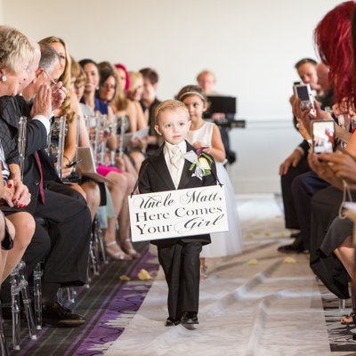 Down Town Club Ceremony - Ring Bearer Carrying Sign