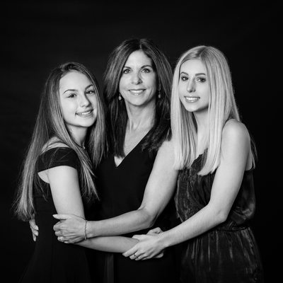 Dramatic and Formal Portrait of Mother and Daughters