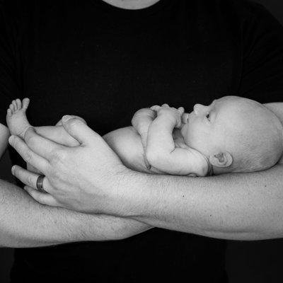 Black and White Newborn Photos - Baby in Dad's Arms