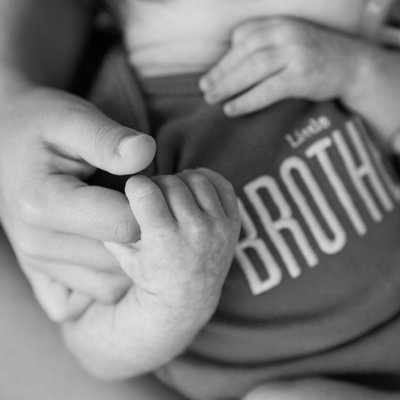 Closeup Baby and Brother Hands