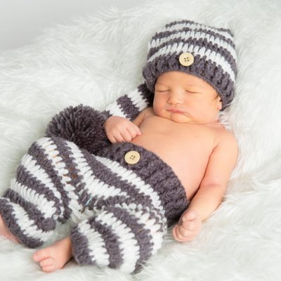 Newborn Photos in Knit Pants and Hat