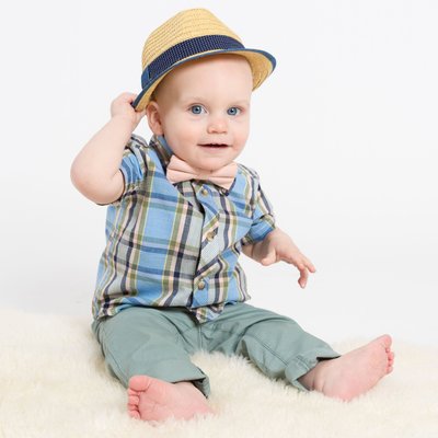 Stylish One Year Old with Hat and Bow Tie