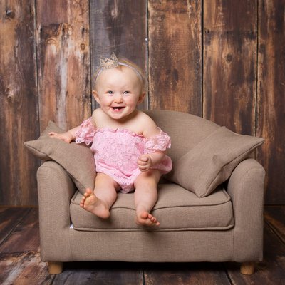 One Year Old Baby on Sofa - Portrait Studio