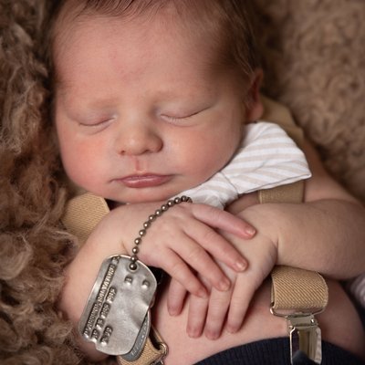 Newborn with Grandfather's Army Tags