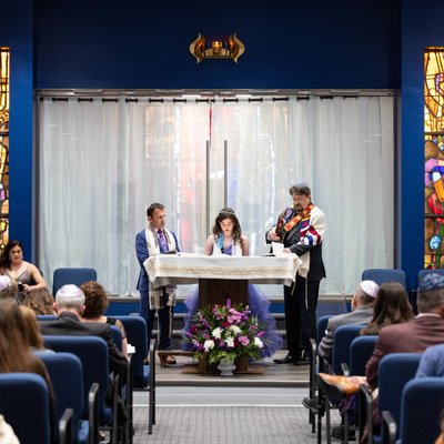 Mitzvah Reads Torah with Rabbi and Cantor