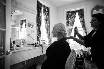 West Chester Bride Getting Hair Sprayed Before Wedding