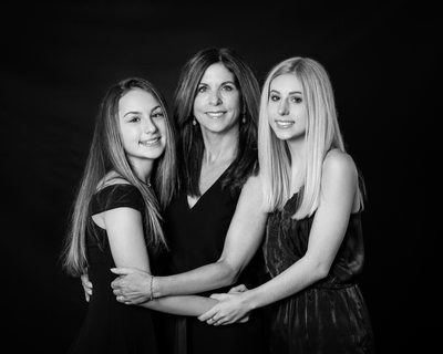 Dramatic and Formal Portrait of Mother and Daughters