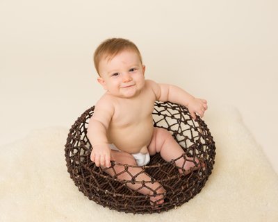 Baby in Basket - Studio Portraits in Malvern