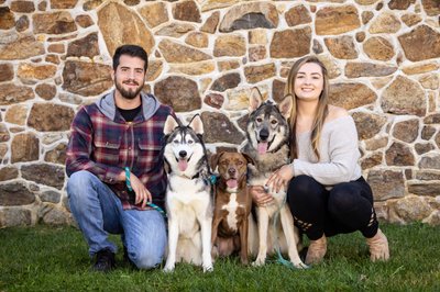 Couple with Three Dogs