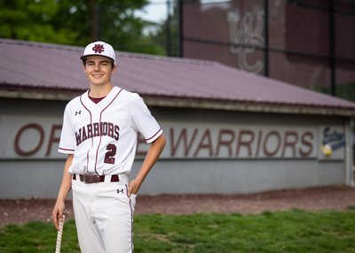 Graduation Portraits on Baseball Field