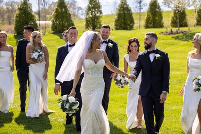 Bridal Party Walking at Terrain Gardens