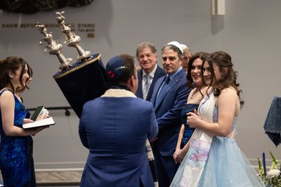 Rabbi Passing the Torah at Bat Mitzvah Service