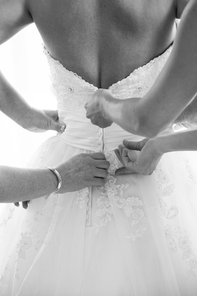 Exton Bridal Prep Photos - Buttoning Bride's Dress