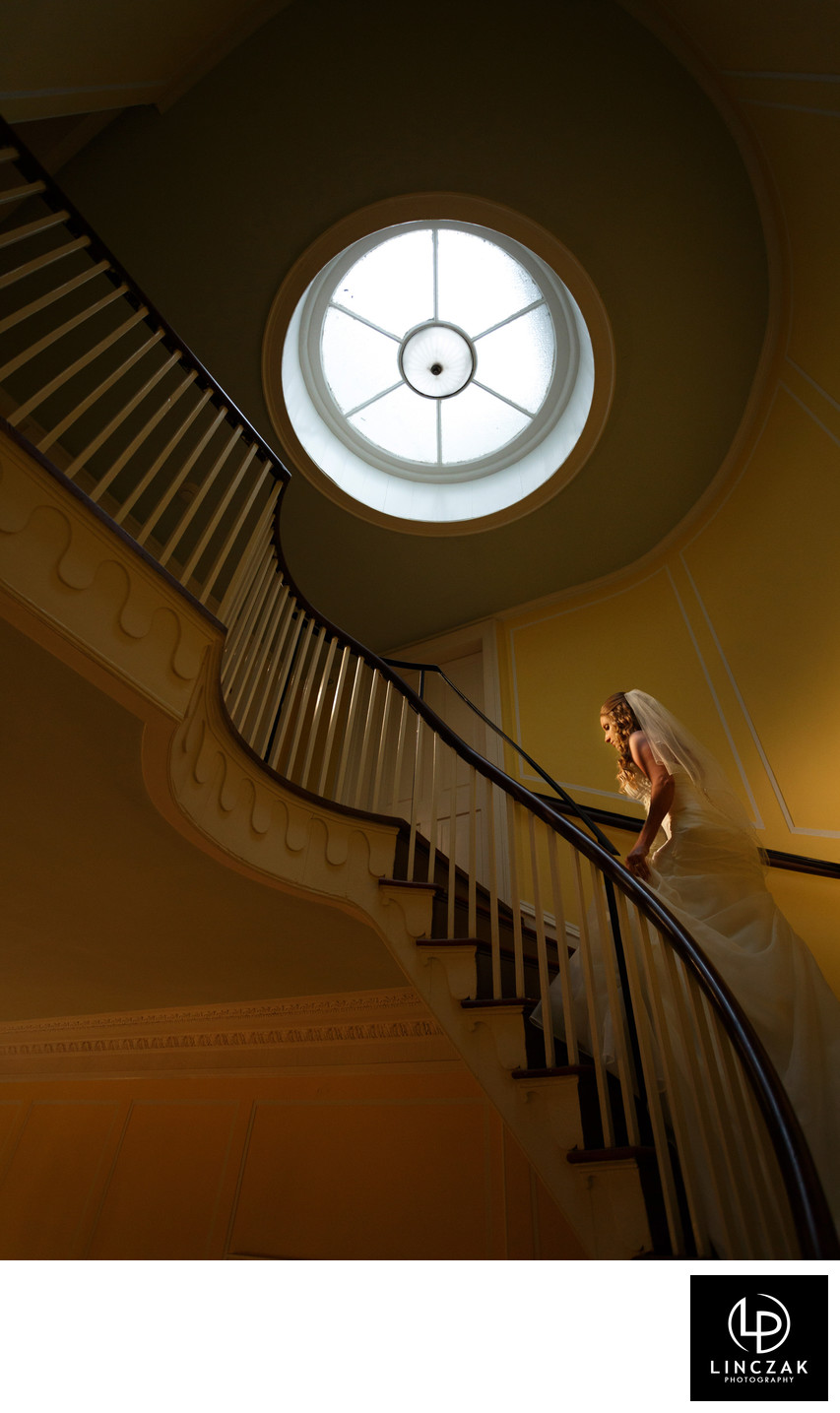 bride on staircase wedding photos