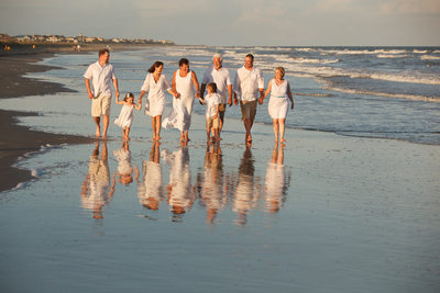 family beach reflection