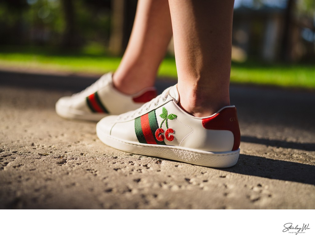 Grad photo detail shot, Gucci sneakers, USC session