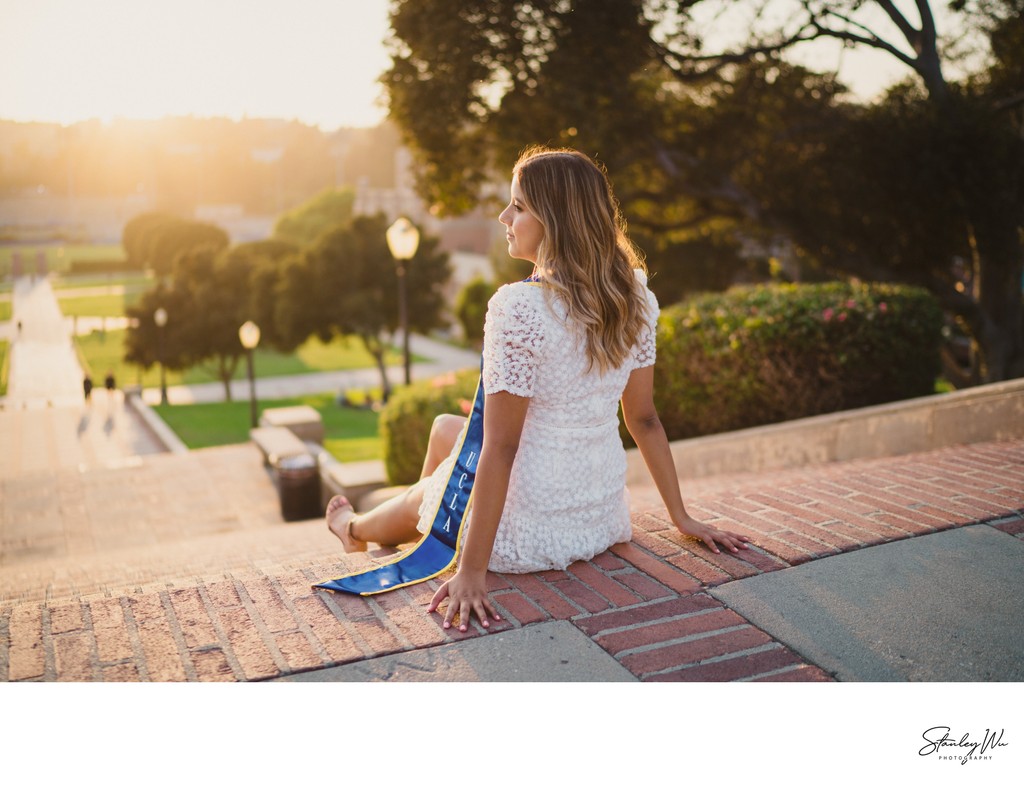 Grad Portrait Sitting by the Sunset at Janss Steps