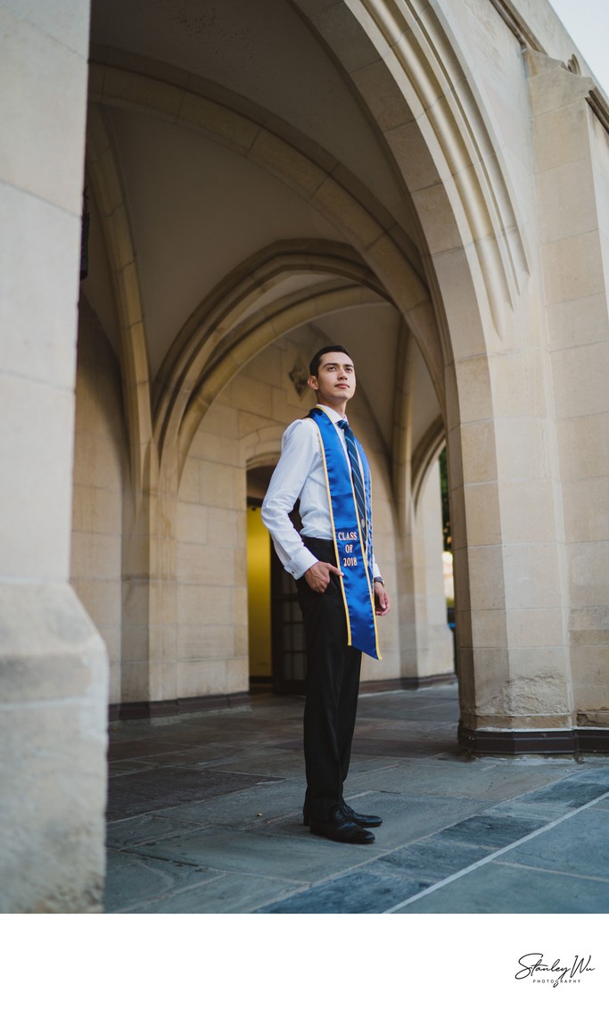 College senior poses for a graduation photo on campus in his cap and gown,  Stock Photo, Picture And Low Budget Royalty Free Image. Pic. ESY-032475108  | agefotostock