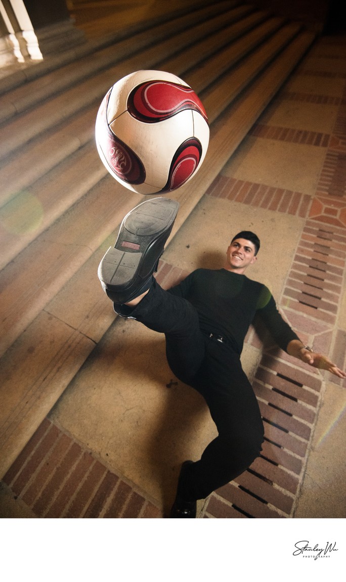 Creative Athletic Graduation Portrait With Soccer Ball