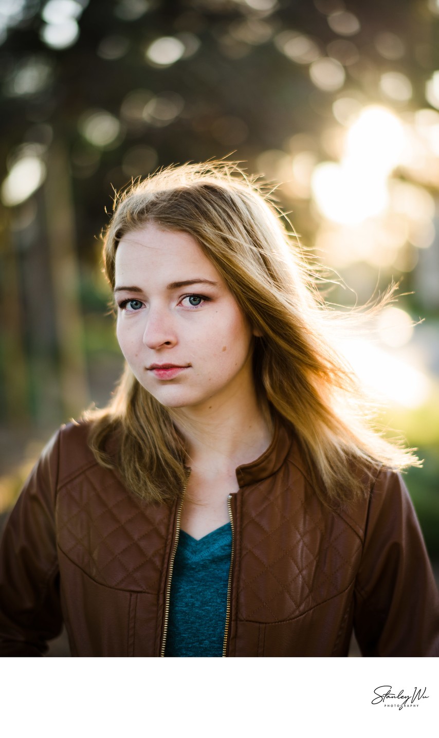 Actor headshot, natural backlight, golden hour glow