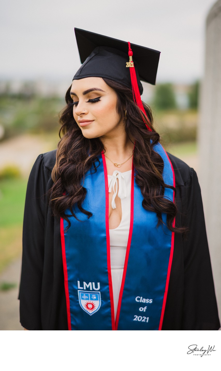 LMU Graduation Portrait in Full Cap and Gown 