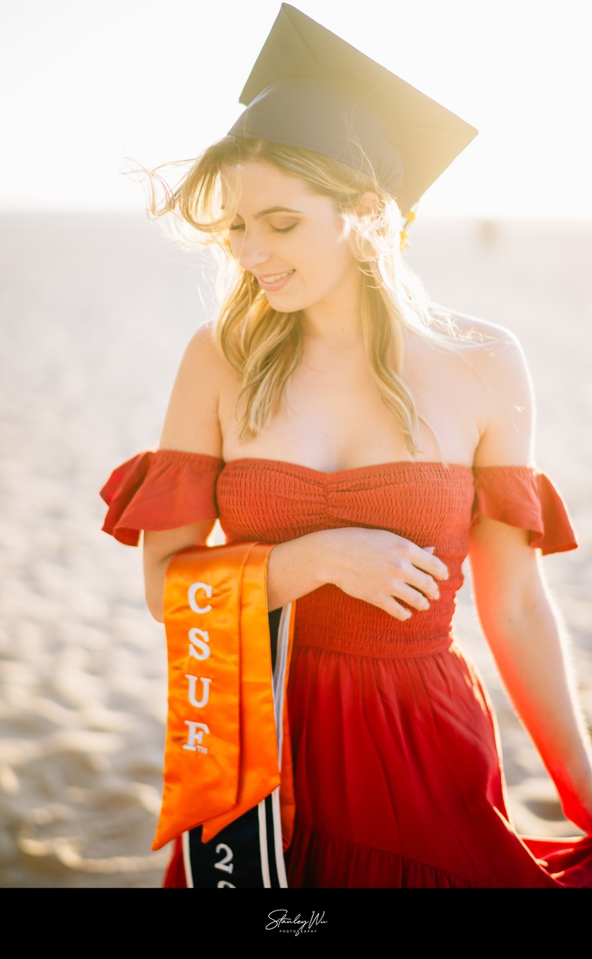 Windswept CSUF Grad Portrait at Huntington Beach