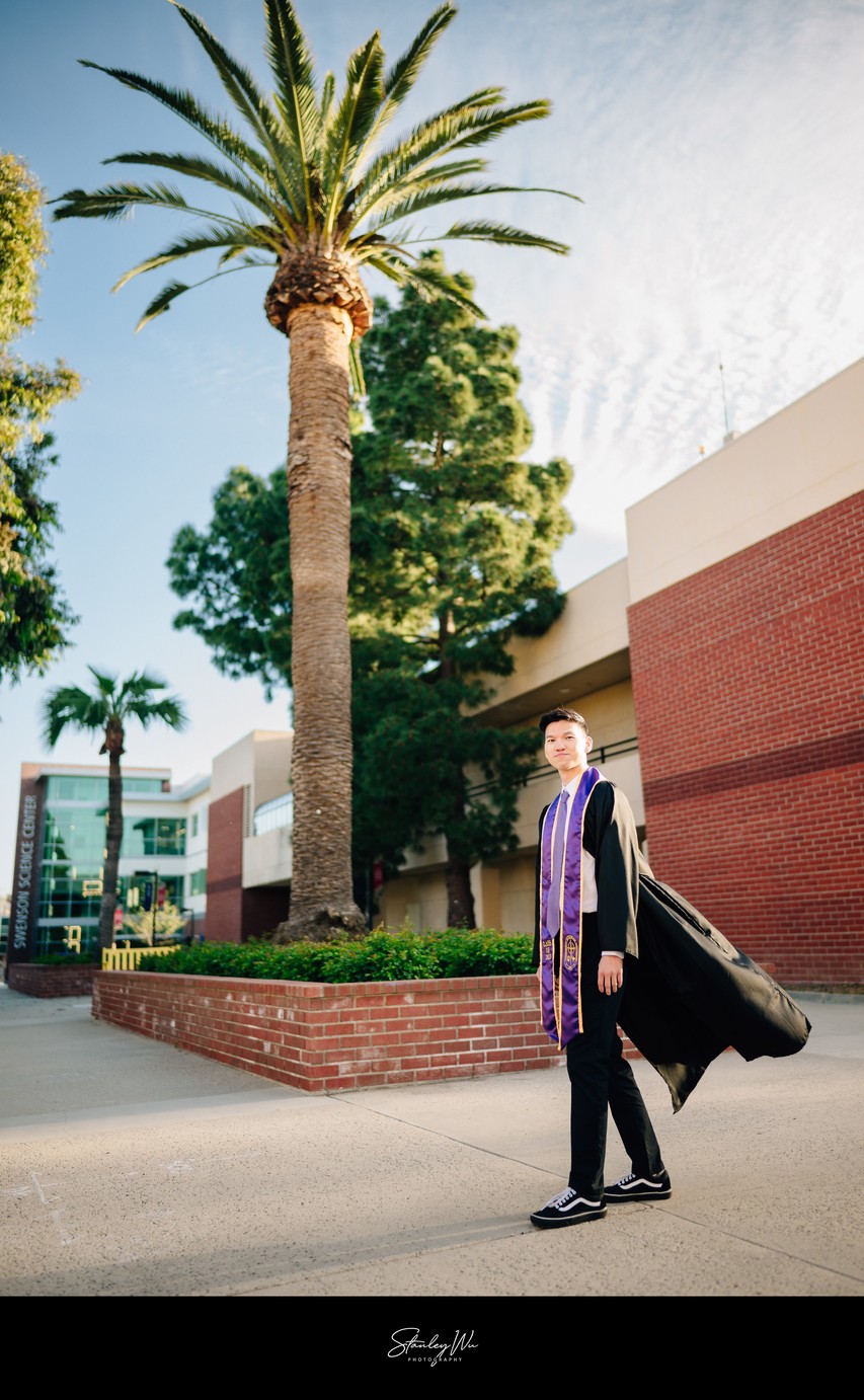 Cal Lutheran grad photo, palm trees, Swenson Science Center