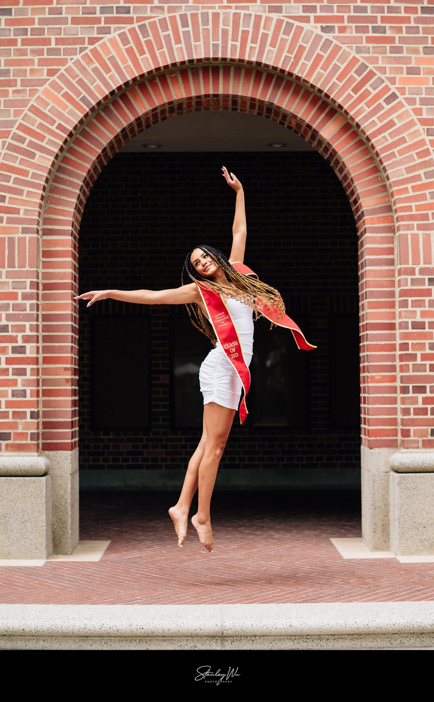 USC grad jump portrait, dance major, Bovard Auditorium