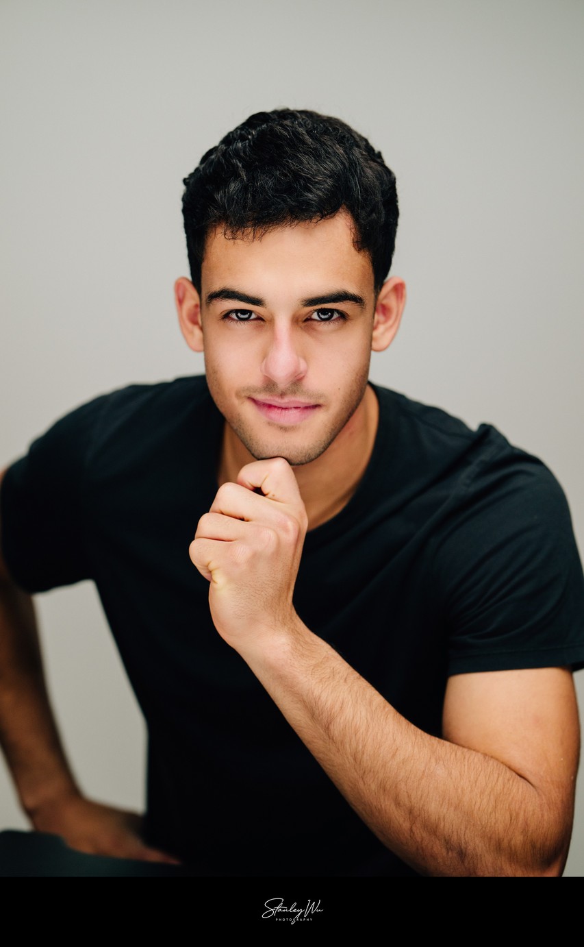 Tech founder headshot, casual studio, confident pose