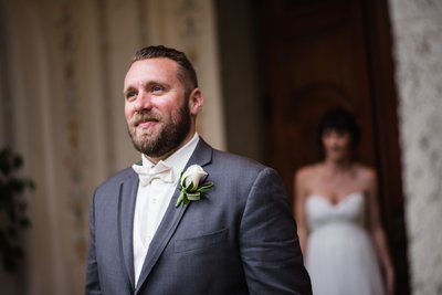 Portrait of Groom Anticipating First Look of Bride