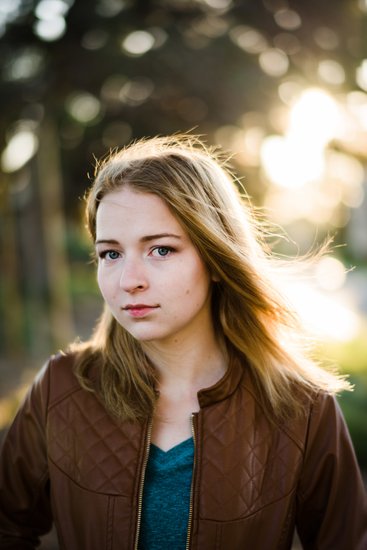Actor headshot, natural backlight, golden hour glow