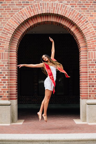 USC grad jump portrait, dance major, Bovard Auditorium