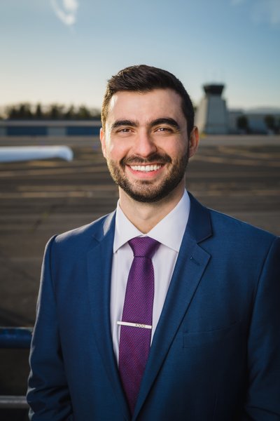 Executive headshot at Santa Monica Airport, golden hour