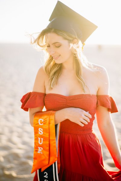Windswept CSUF Grad Portrait at Huntington Beach