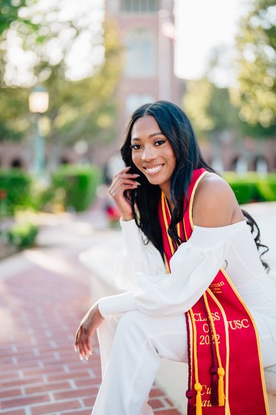 Graduation Portrait Sitting by Fountain at USC