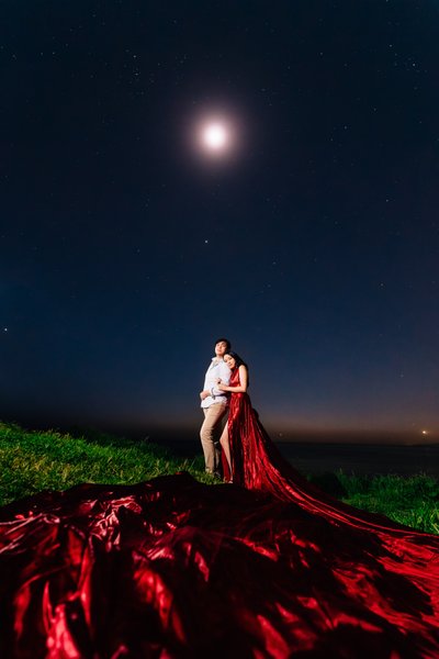 Night sky engagement portrait, red dress, Palos Verdes