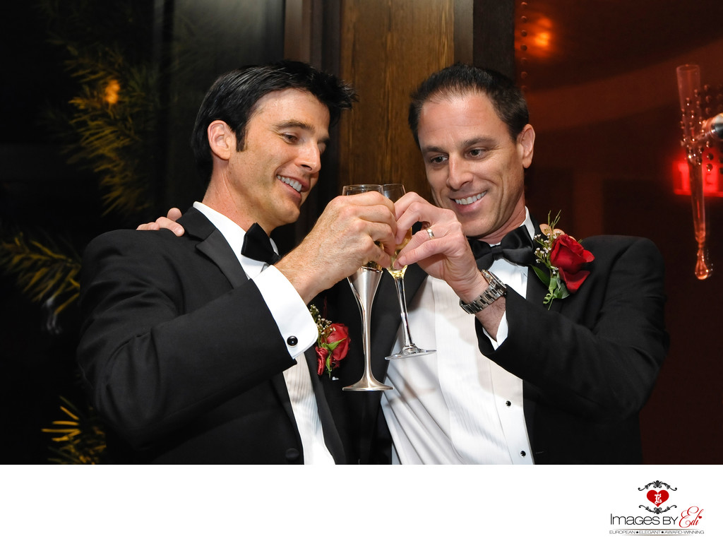 Groom and best man champagne toast at Wynn Las Vegas Hotel reception