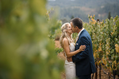 Wedding Couple in Vineyard at Ledson Winery