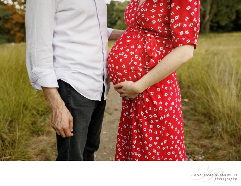 Maternity photos in red dress