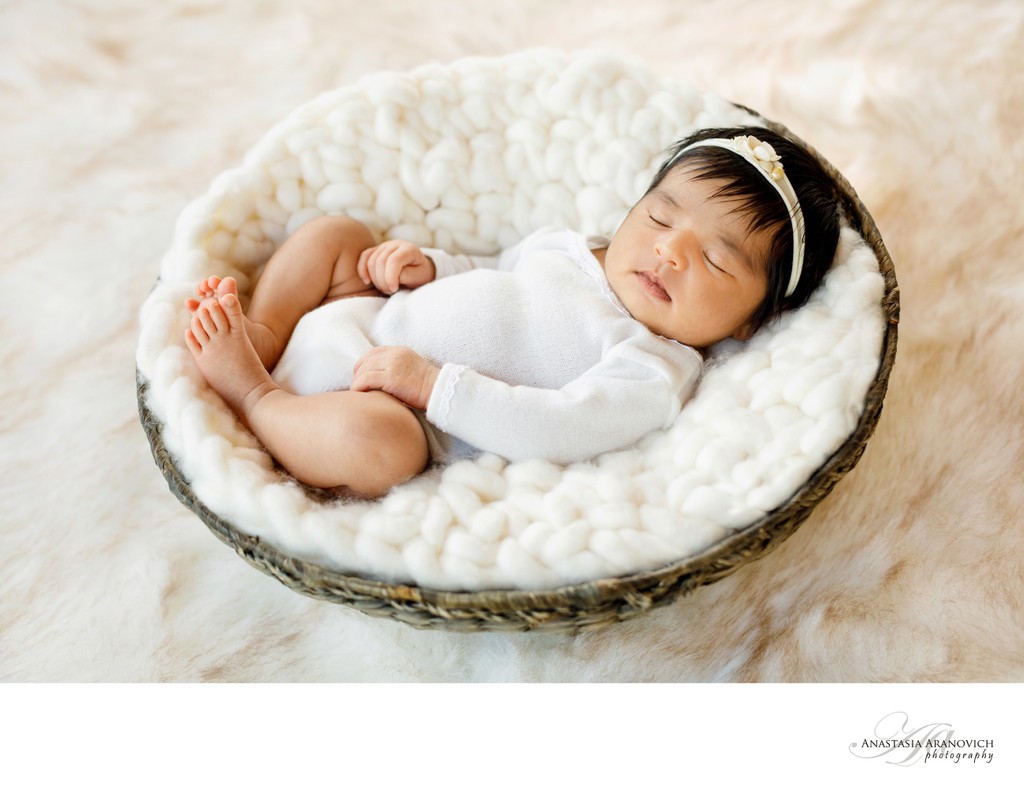 Newborn Baby in Basket