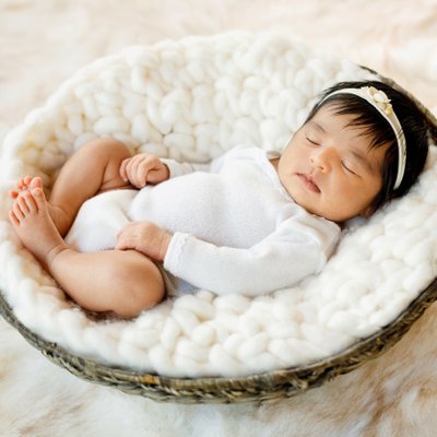 Newborn Baby in Basket
