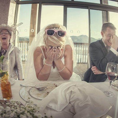 Fun wedding photography of speeches Quay Deganwy