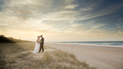 Beach Bride and Groom Photo at sunset at Surfair