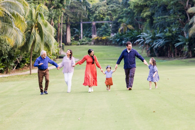 Family walking Tryall Club fairway Jamaica
