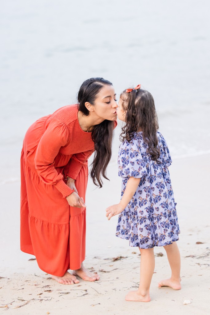 Mother daughter kiss Tryall Club beach Jamaica