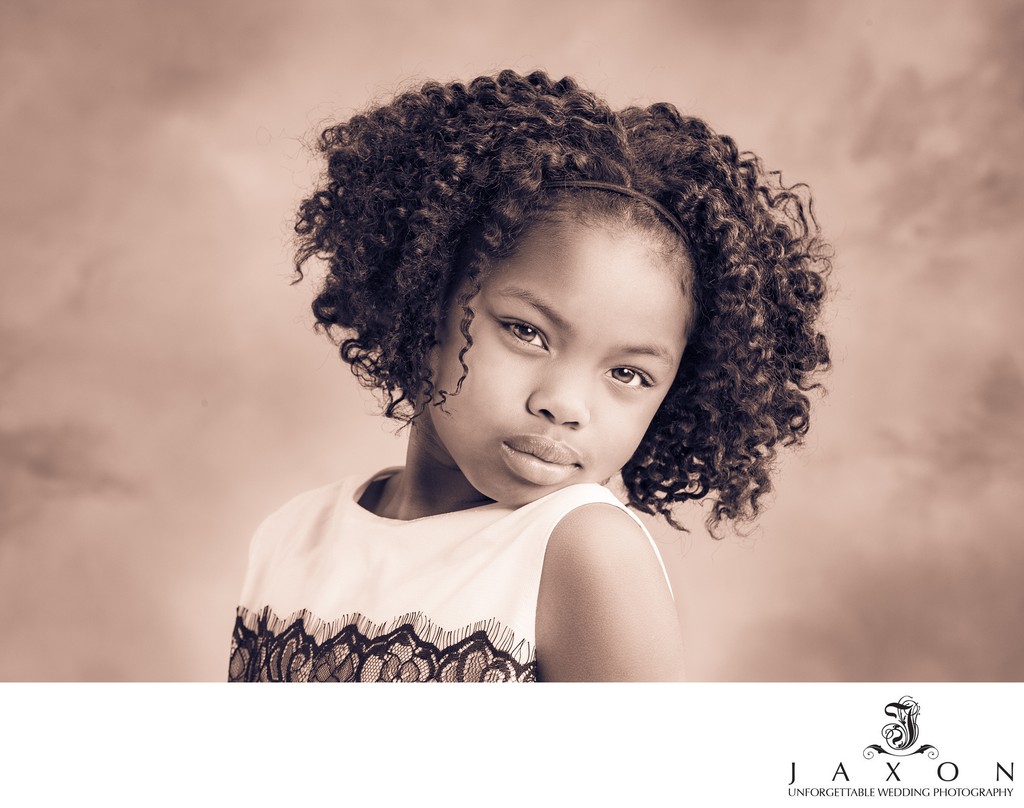 A portrait of a young girl having fun in studio | Jaxon photography