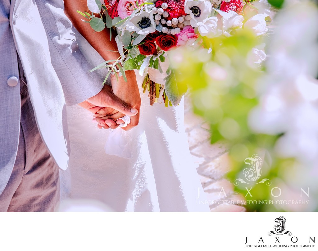 Intimate Wedding Moment: Of Couple Holding Hands