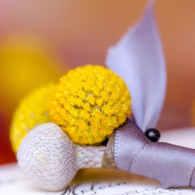 Yellow and gray Billy Balls Boutonniere